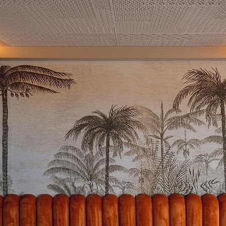 Hotel Jadali & Spa Marrakesh Exterior photo Palm trees on the wall of the lobby