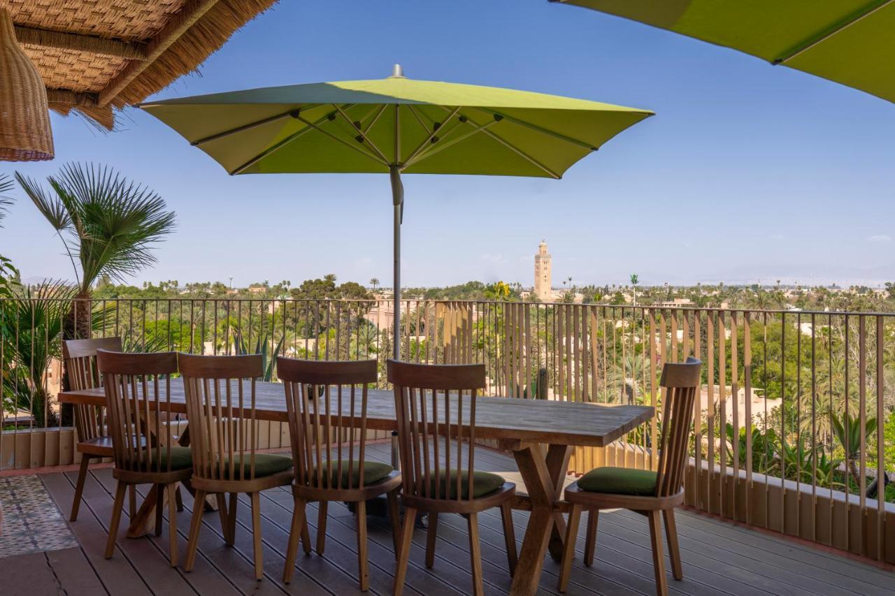 Hotel Jadali & Spa Marrakesh Exterior photo A patio umbrella