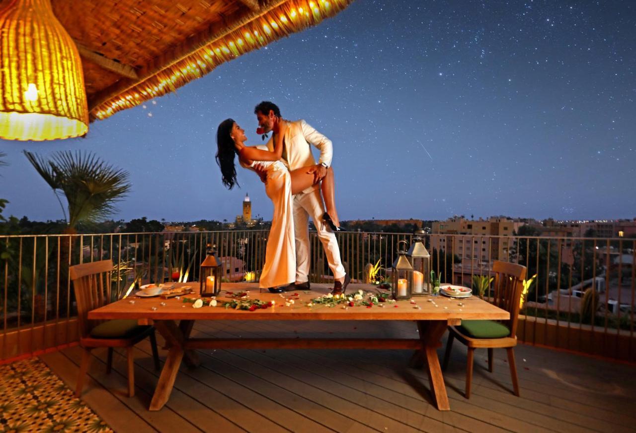 Hotel Jadali & Spa Marrakesh Exterior photo A couple dancing on a rooftop